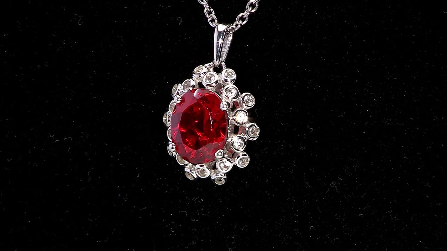 D'Joy Lab Created Padparadscha and White Sapphire 4.10 ctw Floral Bloom Pendant in Rhodium Over Sterling Silver with Stainless Steel Necklace 20 Inches