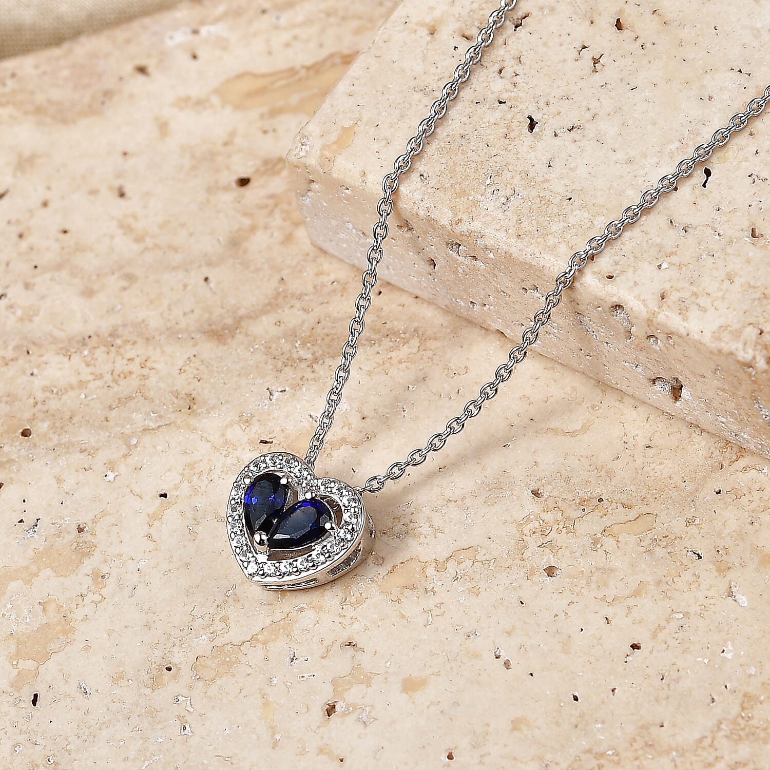 Lab Created Blue and White Sapphire 0.65 ctw Heart Pendant Necklace in Rhodium Over Sterling Silver (20 Inches)