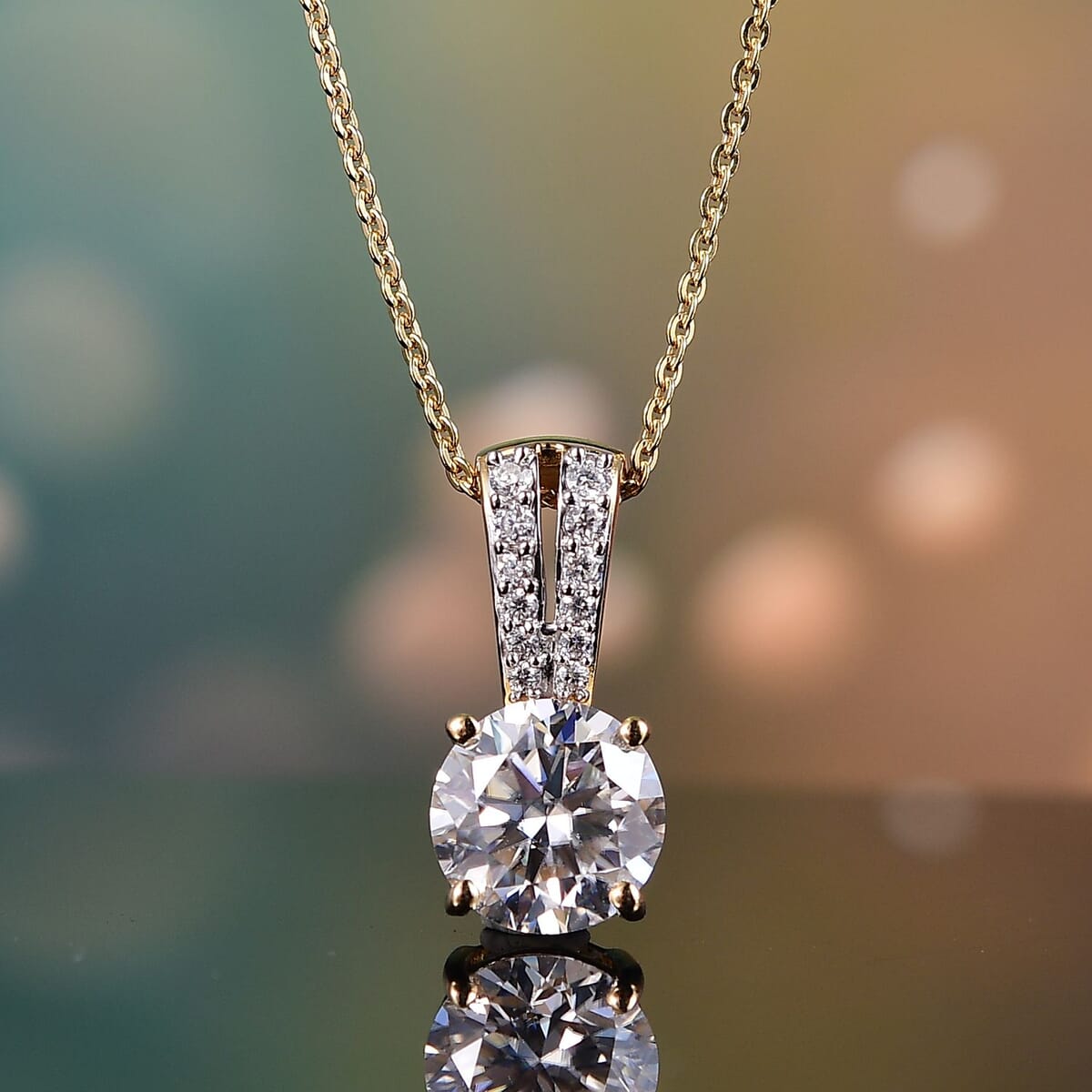 Moissanite 2.00 ctw Bow Pendant Necklace in 18K Vermeil Yellow Gold Over Sterling Silver 20 Inches image number 1