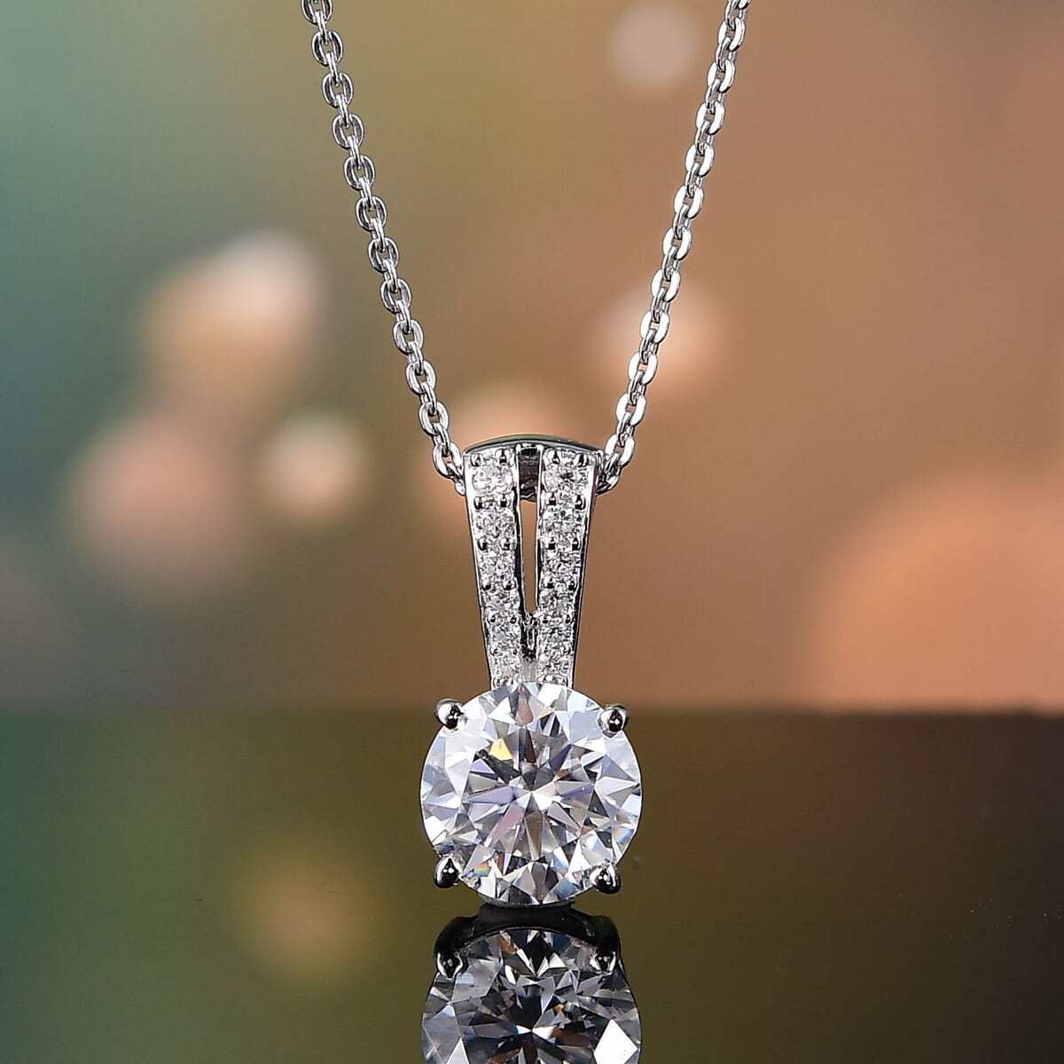 Moissanite 2.10 ctw Bow Pendant Necklace in Rhodium Over Sterling Silver 20 Inches image number 1