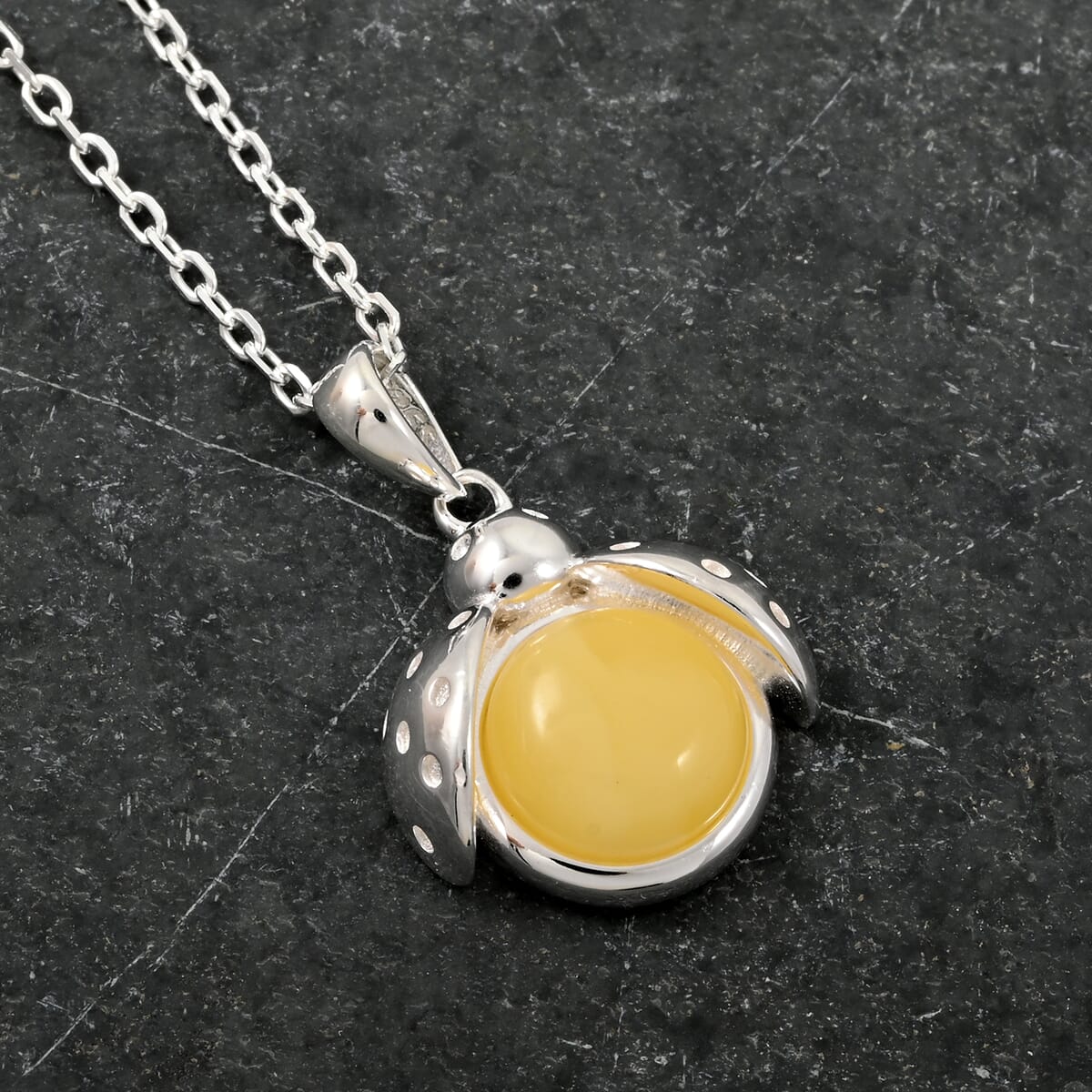 Butterscotch Amber Round Pendant Necklace in Sterling Silver 16 Inches image number 1