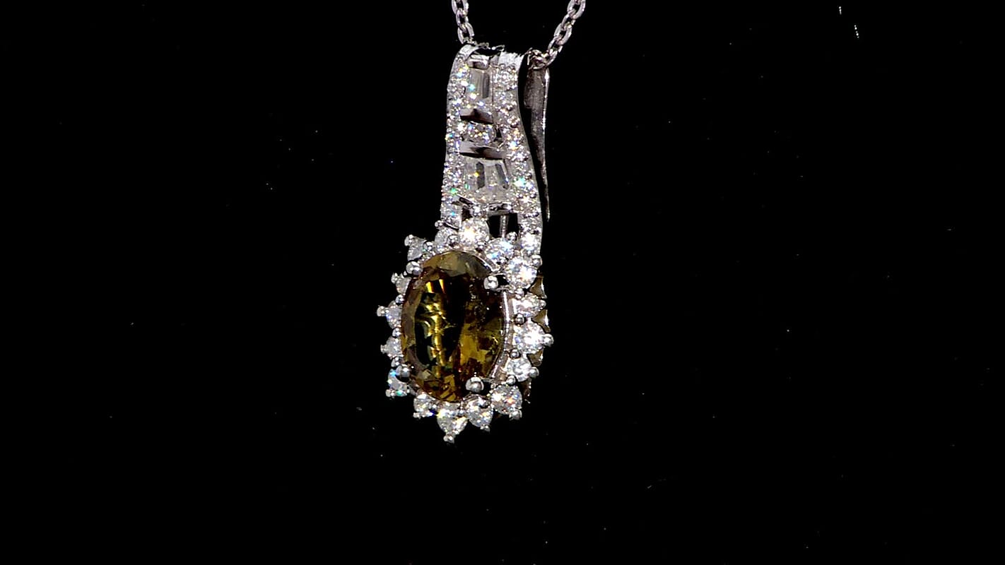 D'Joy Premium Golden Tanzanite and Moissanite 1.65 ctw Ember Glow Pendant Necklace in Rhodium Over Sterling Silver 20 Inches