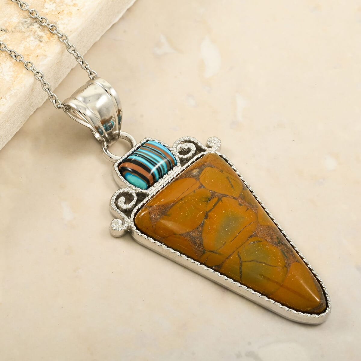 Center Stone Color Varies Inlay Frame Southwest Arrowhead Bamboo Jasper 20.00 ctw Pendant in Silvertone with Stainless Steel Necklace (20 Inches) image number 1