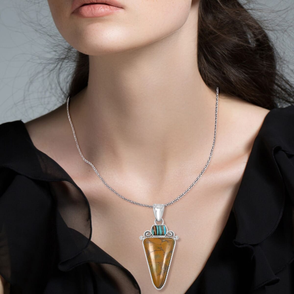 Center Stone Color Varies Inlay Frame Southwest Arrowhead Bamboo Jasper 20.00 ctw Pendant in Silvertone with Stainless Steel Necklace (20 Inches) image number 2