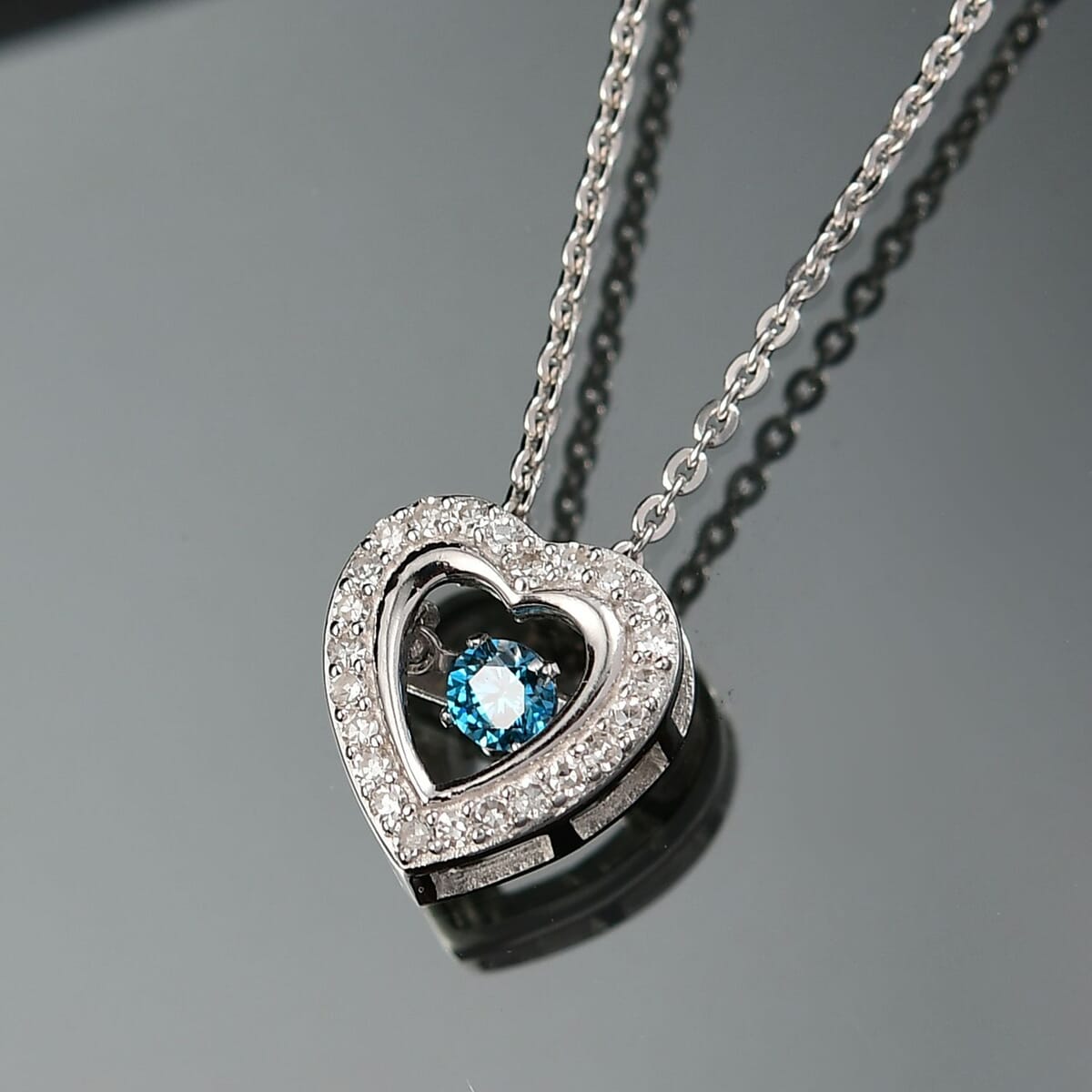 Luxuriant Lab Grown Blue Diamond (IR) (SI) and Lab Grown Diamond 0.25 ctw Dancing Heart Pendant Necklace in Rhodium Over Sterling Silver 20 Inches image number 1