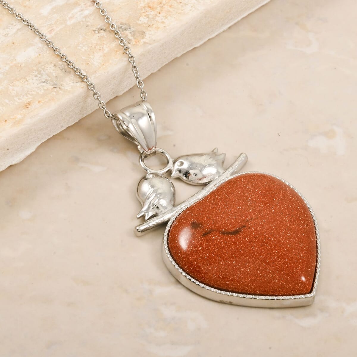 Inlay Heart Frame Love-Bird Brown Goldstone 48.00 ctw Pendant in Silvertone with Stainless Steel Necklace (20 Inches) image number 1