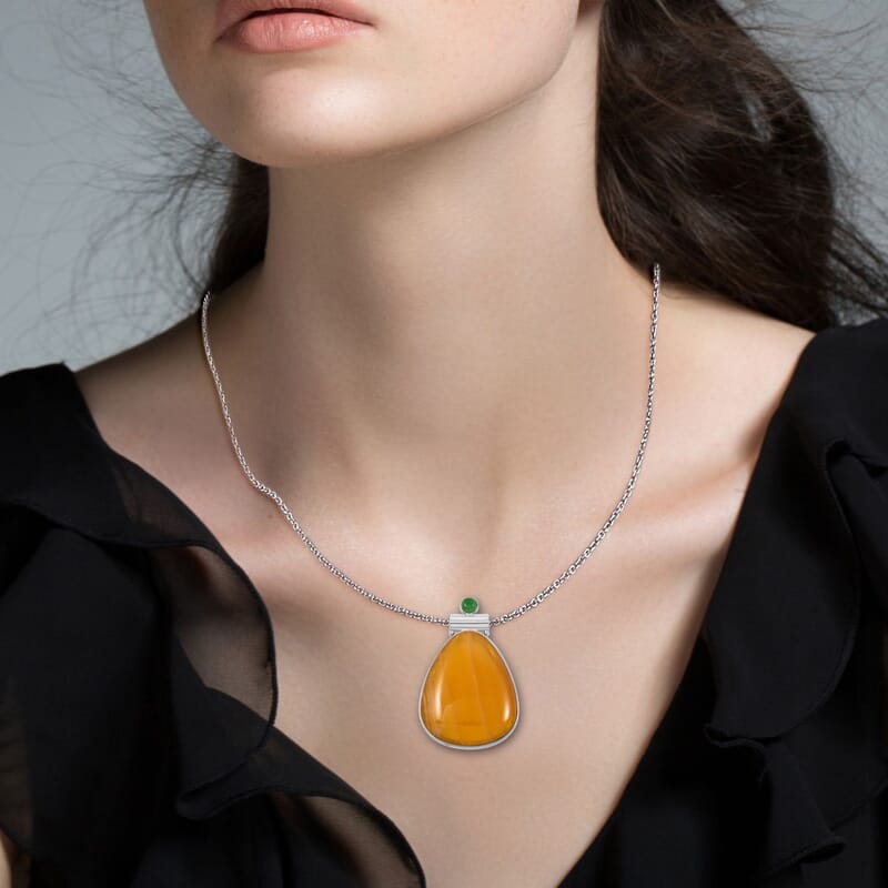 Center Stone Color Varies Inlay Frame Freeform Golden Imperial Calcite 61.00 ctw Pendant in Silvertone with Stainless Steel Necklace (20 Inches)