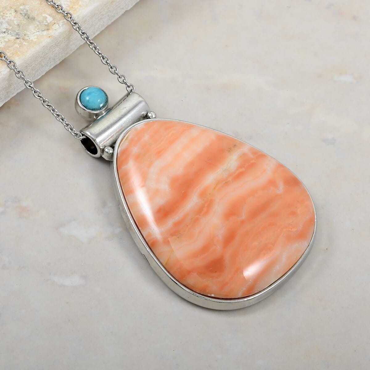 Center Stone Color Varies Hand-Polished Peach Zebra Jasper 50.50 ctw Inlay Drop Pendant in Silvertone with Stainless Steel Necklace (20 Inches) image number 1