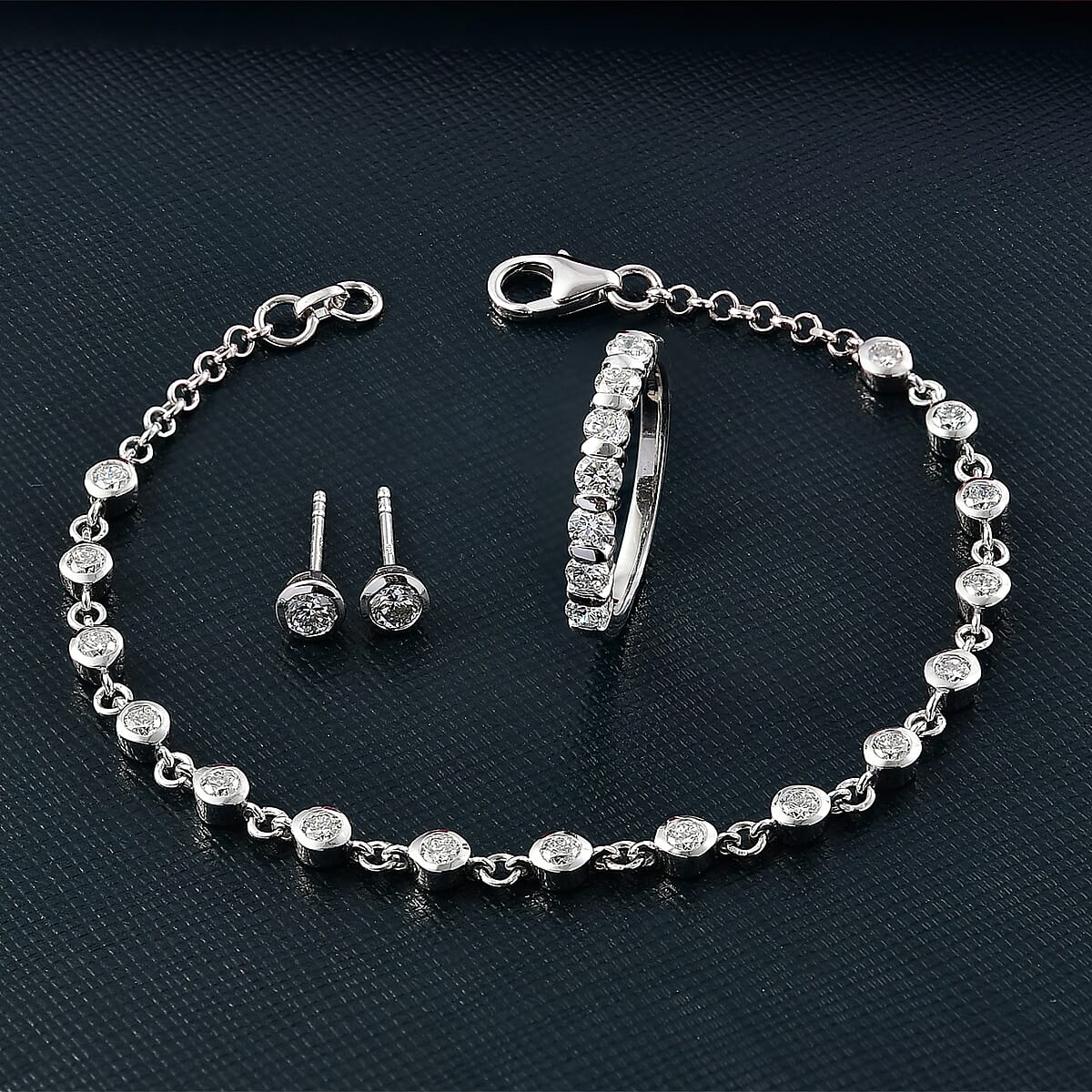 Luxuriant Lab Grown Diamond SI-I1 2.80 ctw Ring (Size 7.0) and Stud Earrings and Linking Bracelet (7.25In) in Rhodium Over Sterling Silver image number 1