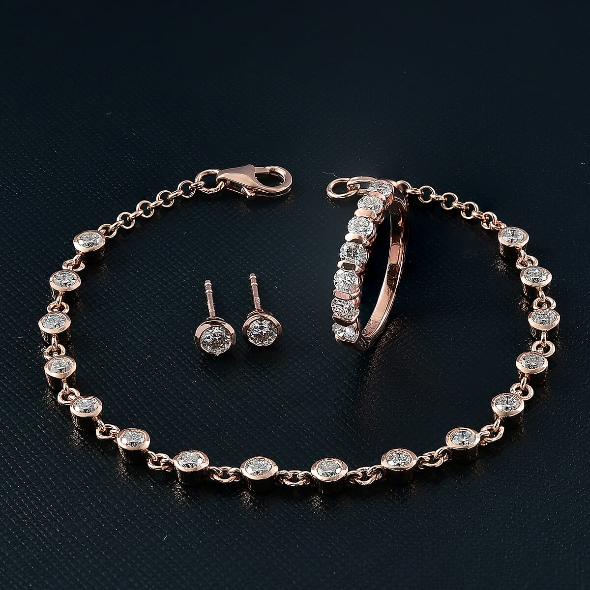 Luxuriant Lab Grown Diamond SI-I1 2.80 ctw Ring (Size 8.0) and Stud Earrings and Linking Bracelet (7.25In) in 18K Vermeil Rose Gold Over Sterling Silver image number 1