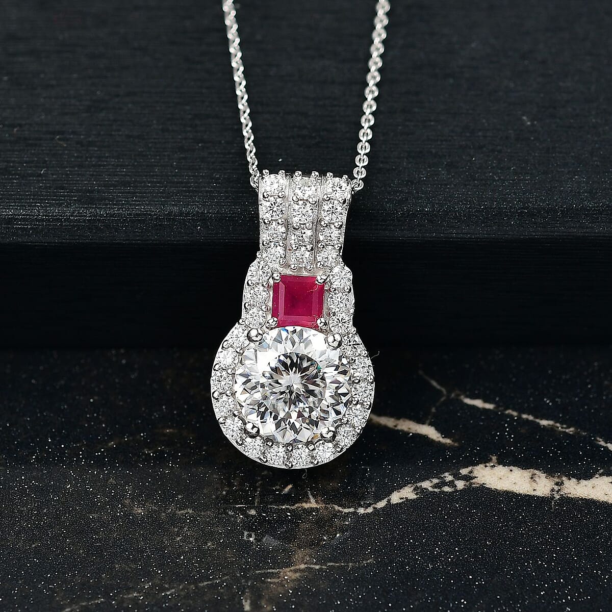 D'Joy 120 Facet Moissanite and Niassa Ruby (FF) 3.80 ctw Pendant Necklace in Rhodium Over Sterling Silver 20 Inches image number 1