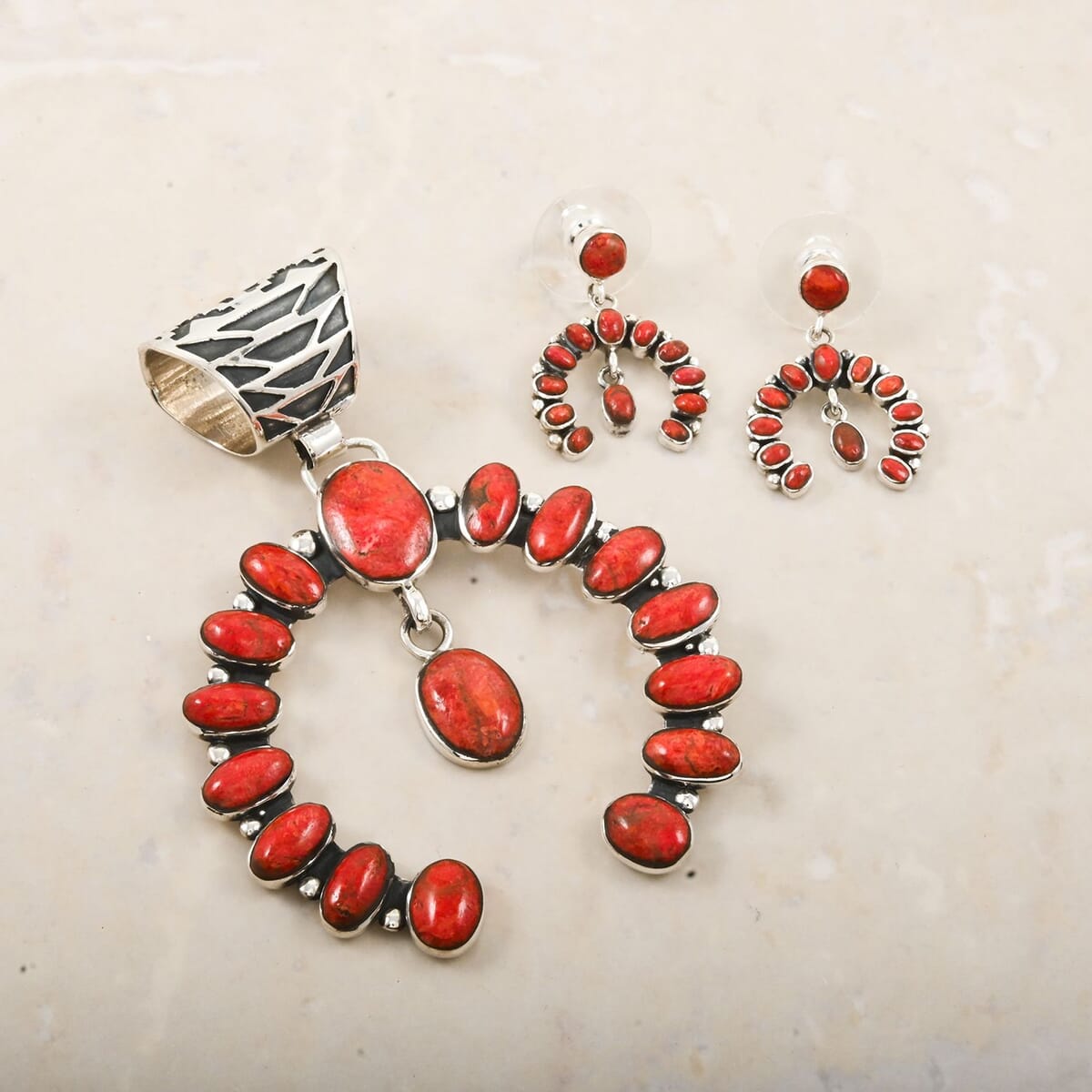 Santa Fe Style Enhanced Red Coral 12.00 ctw Horseshoe Pendant and Earrings in Sterling Silver image number 1