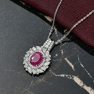 D'Joy Premium Taveta Ruby and Moissanite 2.80 ctw Floral Burst Pendant Necklace in Rhodium Over Sterling Silver 20 Inches