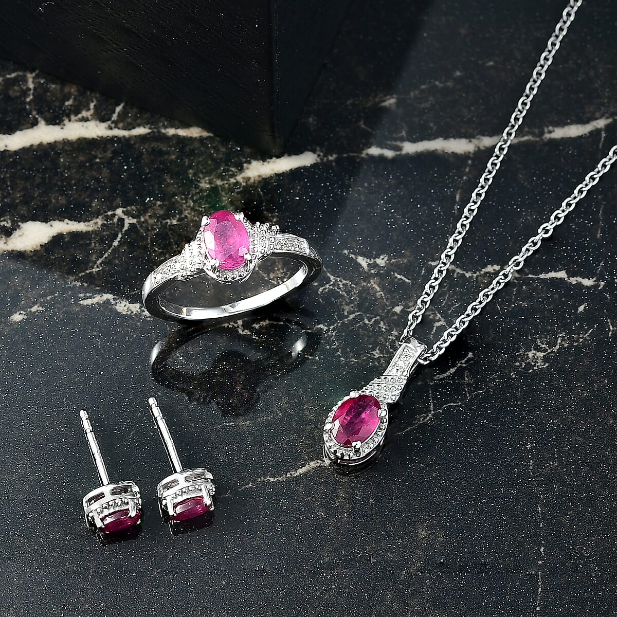 D'Joy Niassa Ruby (FF), White Zircon 3.10 ctw Sea Waves Stud Earrings, Ring (Size 6) and Pendant Necklace 20 Inches in Rhodium Over Sterling Silver  image number 1