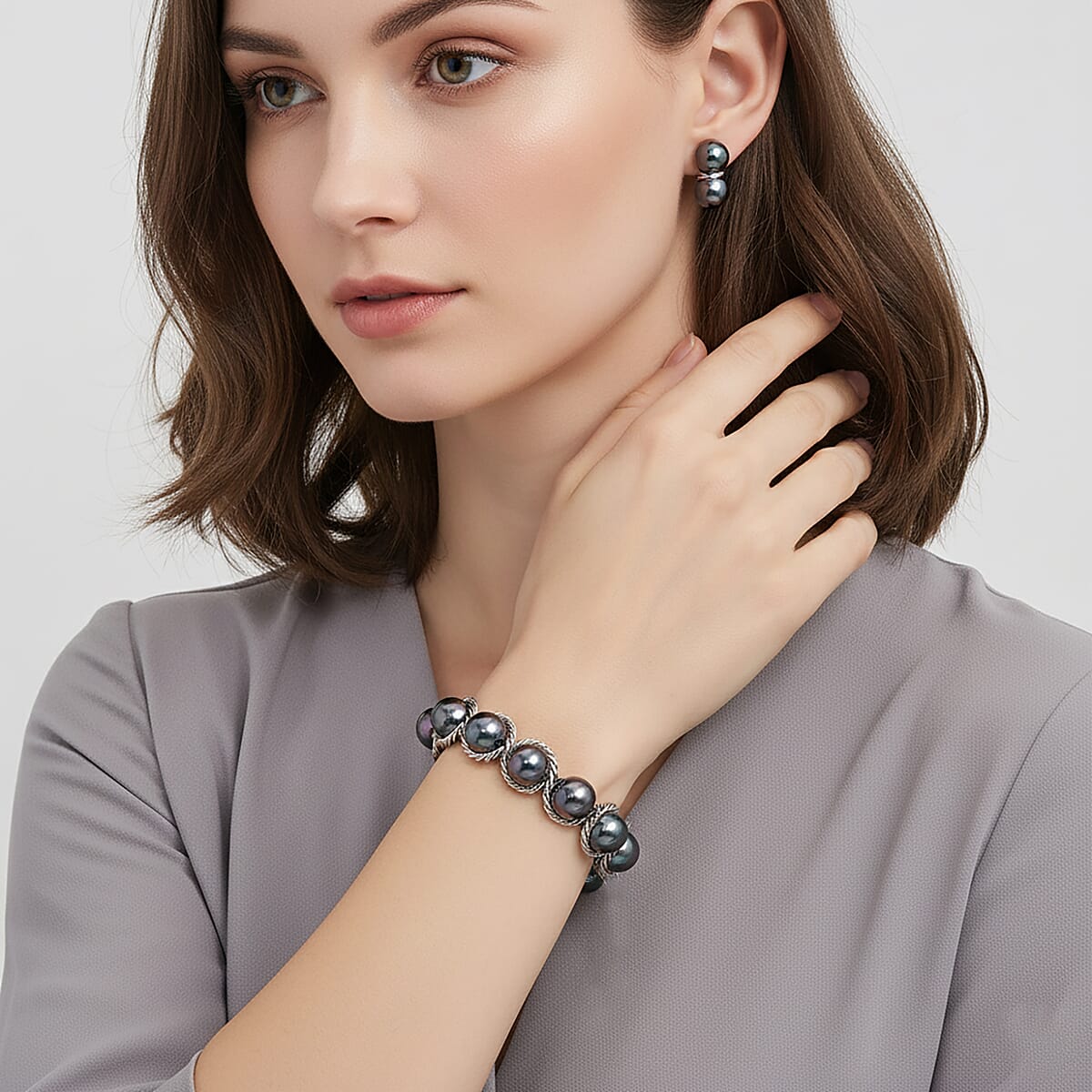 Peacock Color Shell Pearl Twilight Waves Bracelet (7.75-9.75In) and Stud Earrings in Stainless Steel image number 2