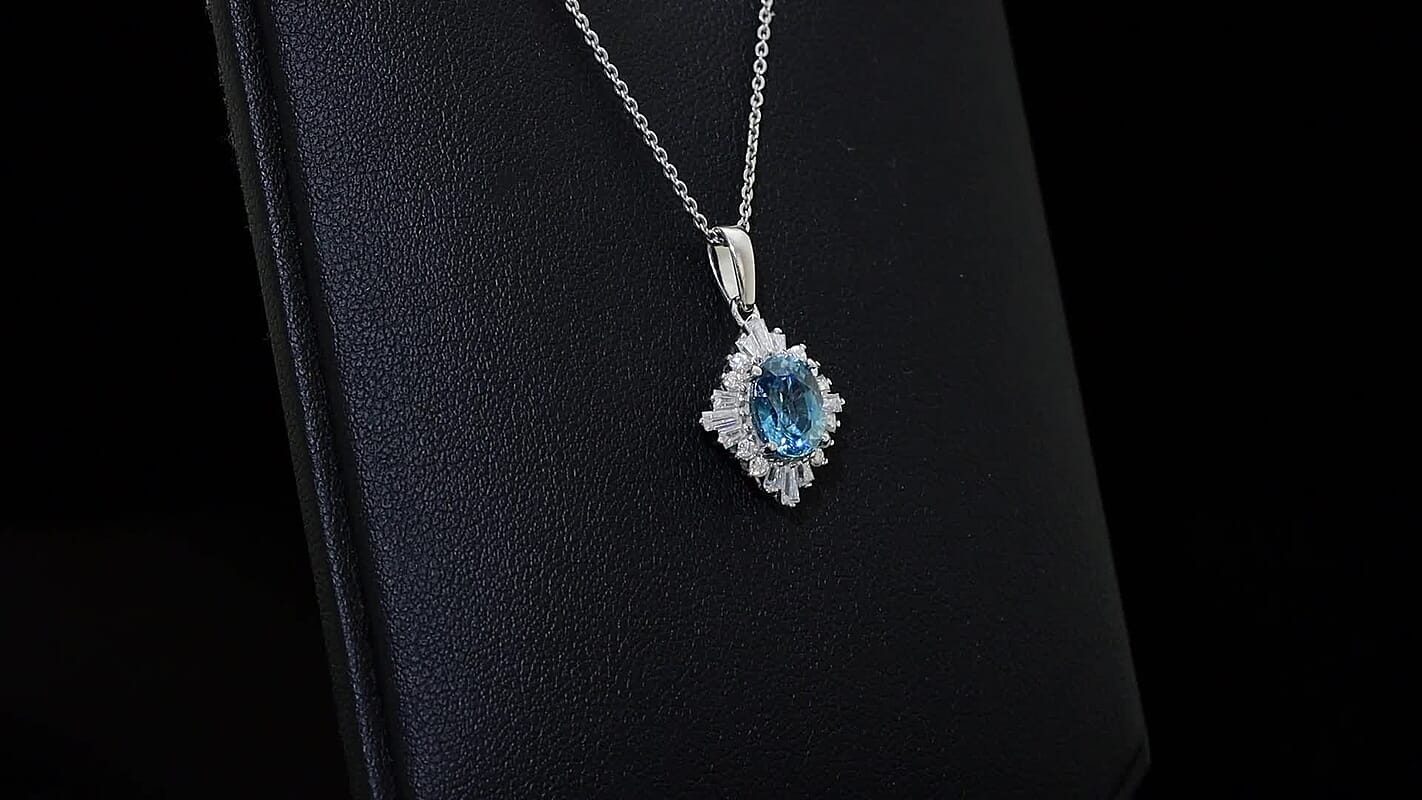 D'Joy Premium Cambodian Blue Zircon and Moissanite 2.50 ctw Royal Flare Pendant Necklace in Rhodium Over Sterling Silver 20 Inches