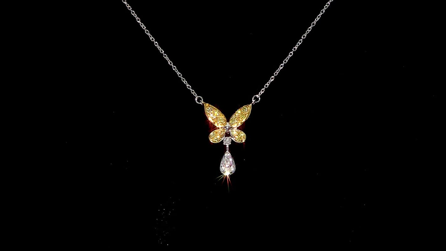 Luxuriant Lab Grown Yellow Diamond (IR) and Lab Grown Diamond VS 0.25 ctw Butterfly Pendant Necklace in Rhodium Over Sterling Silver 18-20 Inches