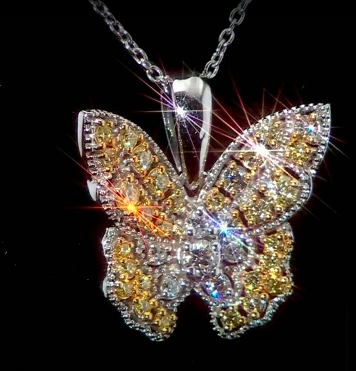Luxuriant Lab Grown Yellow Diamond (IR) and Lab Grown Diamond VS 0.50 ctw Butterfly Pendant Necklace in Rhodium Over Sterling Silver 20 Inches image number 2