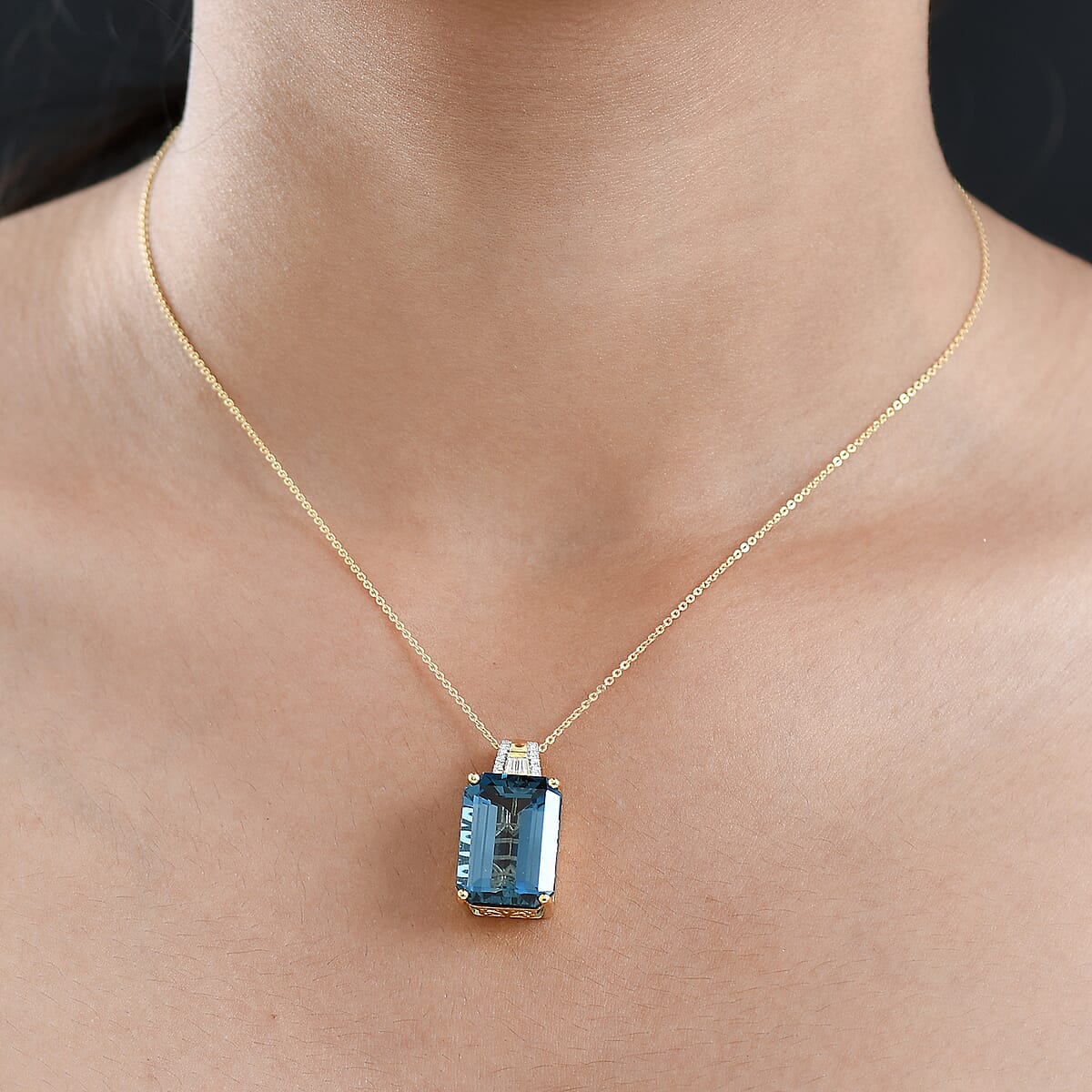 Doorbuster D'Joy London Blue Topaz and Moissanite 19.20 ctw Midnight Elegance Pendant Necklace in 18K Vermeil Yellow Gold Over Sterling Silver 20 Inches image number 2