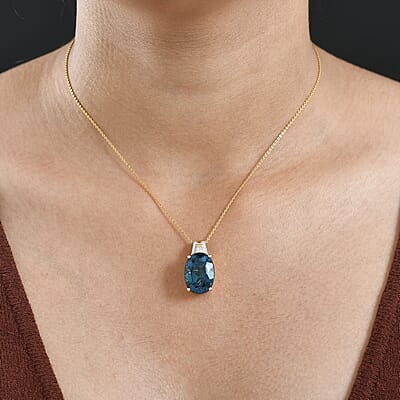  D'Joy London Blue Topaz and Moissanite 19.20 ctw Midnight Elegance Pendant Necklace in 18K Vermeil Yellow Gold Over Sterling Silver 20 Inches