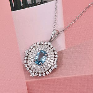 D'Joy Premium Cambodian Blue Zircon and Moissanite 3.50 ctw Regal Halo Pendant Necklace in Rhodium Over Sterling Silver 20 Inches