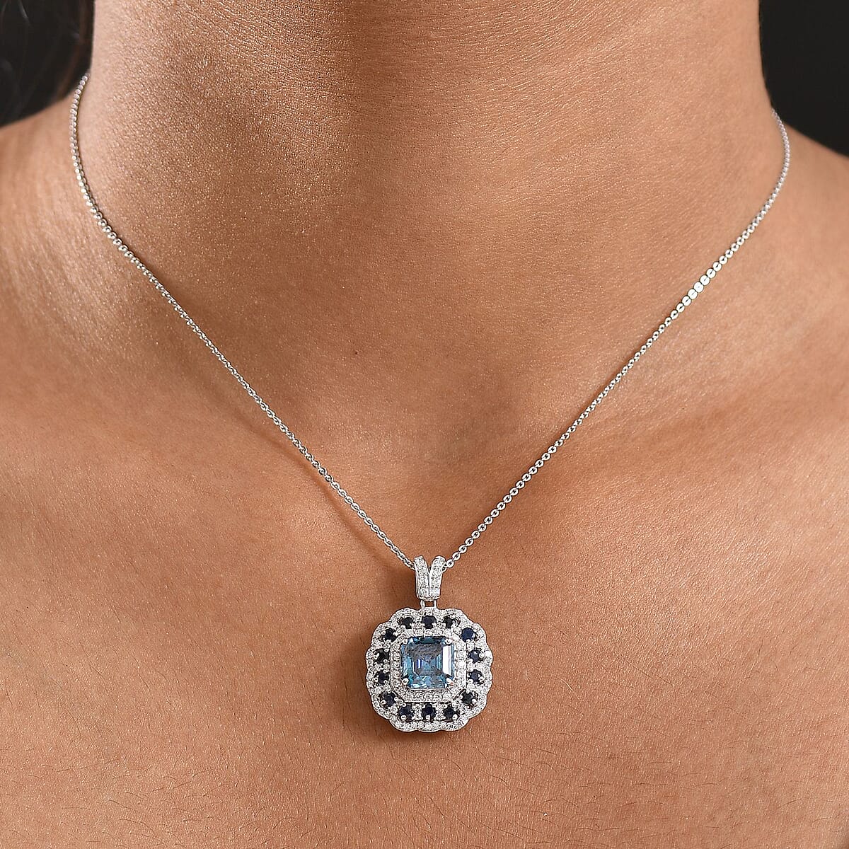 Doorbuster D'Joy Asscher Cut Blue and White Moissanite, Blue Sapphire 2.90 ctw Floral Halo Pendant Necklace in Rhodium Over Sterling Silver 20 Inches image number 2