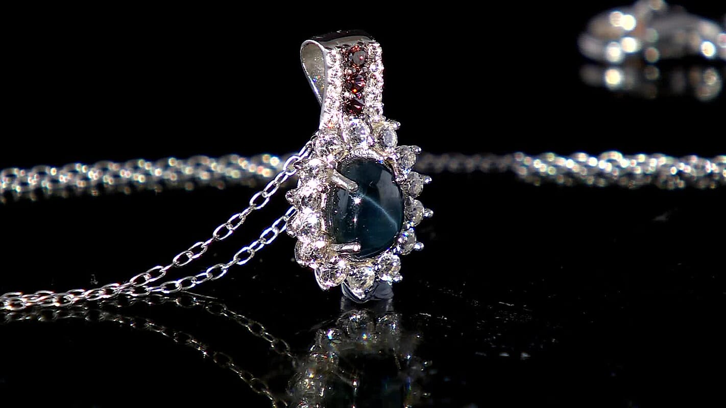 D'Joy Premium Blue Star Sapphire (DF), White and Chocolate Zircon 2.00 ctw Starfire Pendant Necklace in Rhodium Over Sterling Silver 20 Inches