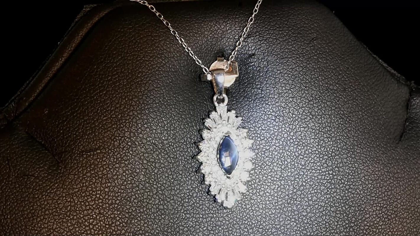 D'Joy Premium Blue Star Sapphire (DF) and Moissanite 1.65 ctw Crown Ray Pendant Necklace in Rhodium Over Sterling Silver 20 Inches