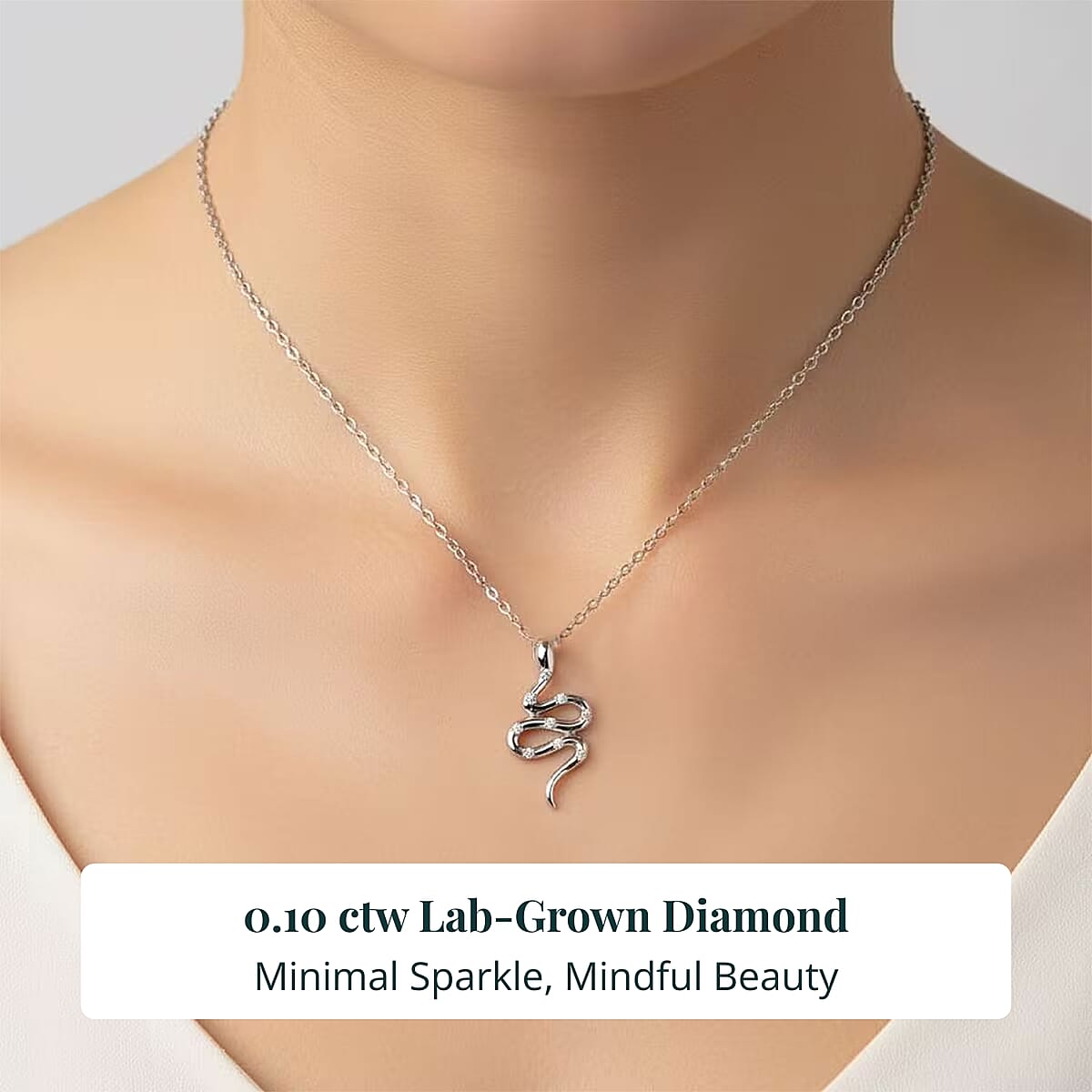 Doorbuster Luxuriant Lab Grown Diamond G-H SI 0.10 ctw Serpent Pendant Necklace in Rhodium Over Sterling Silver 20 Inches image number 1