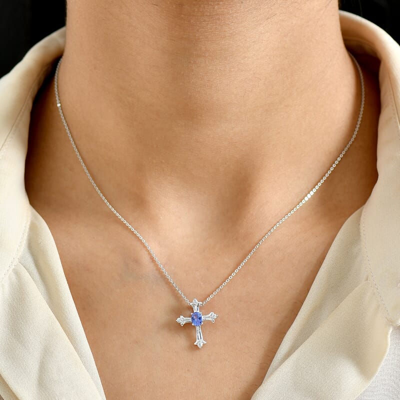 D'Joy AAA Tanzanite, White Zircon Cross Pendant Necklace in Rhodium Over Sterling Silver 0.50 ctw (20 Inches)