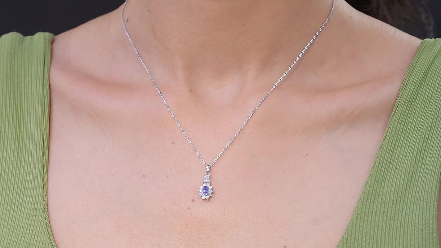 D'Joy AAA Tanzanite, Moissanite Starburst Pendant Necklace in Rhodium Over Sterling Silver 0.60 ctw (20 Inches)