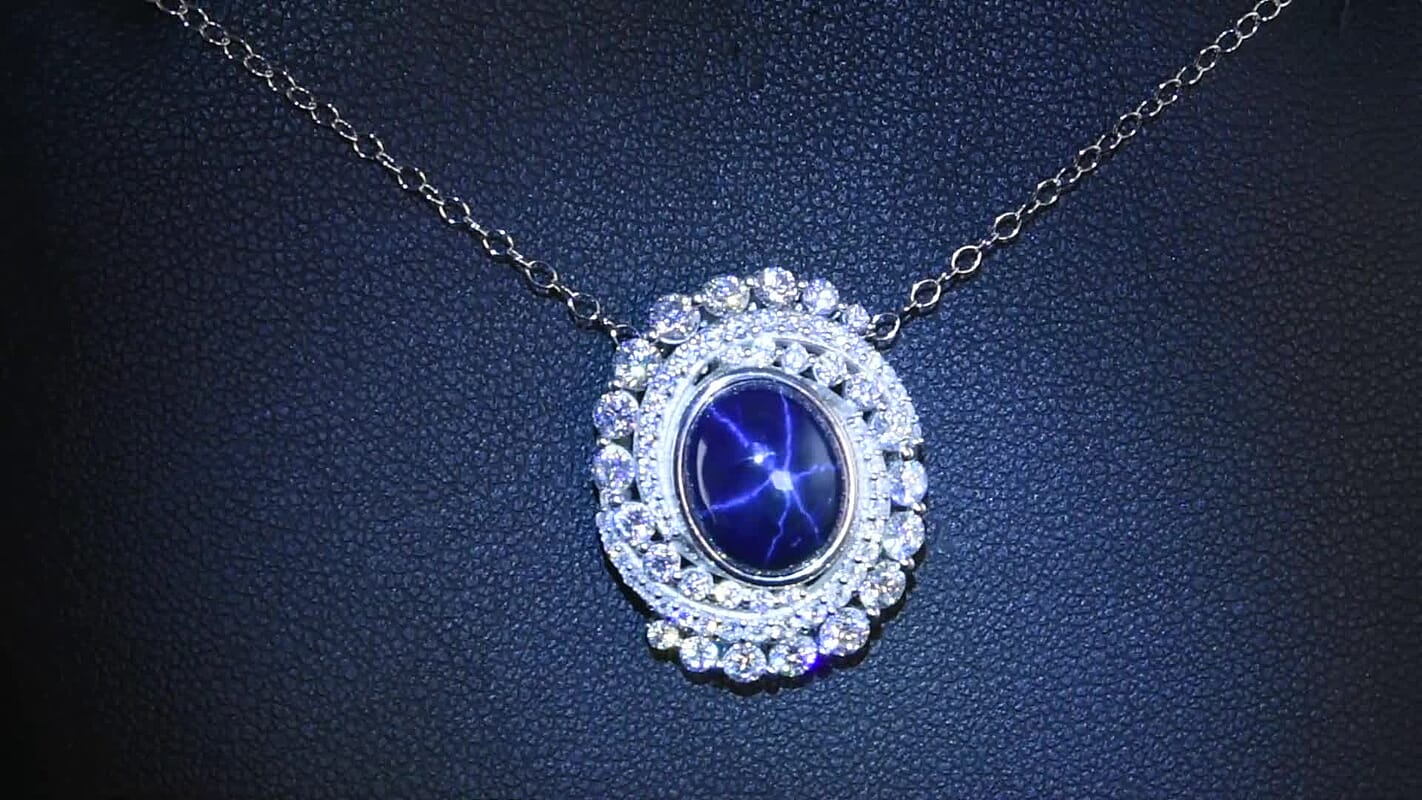 D'Joy Blue Star Sapphire (DF) and Moissanite 7.65 ctw Midnight Galaxy Pendant Necklace in Rhodium Over Sterling Silver 20 Inches