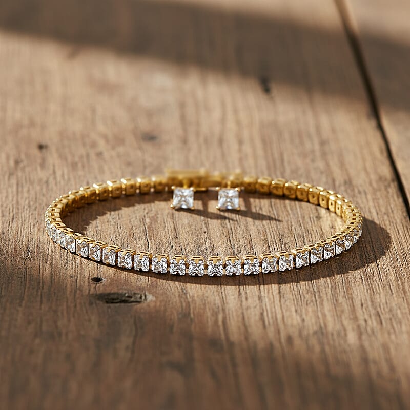 2 Piece Set - Fancy Cut Simulated Diamond 5.60 ctw Tennis Bracel (7.50 In) and Earrings in Goldtone