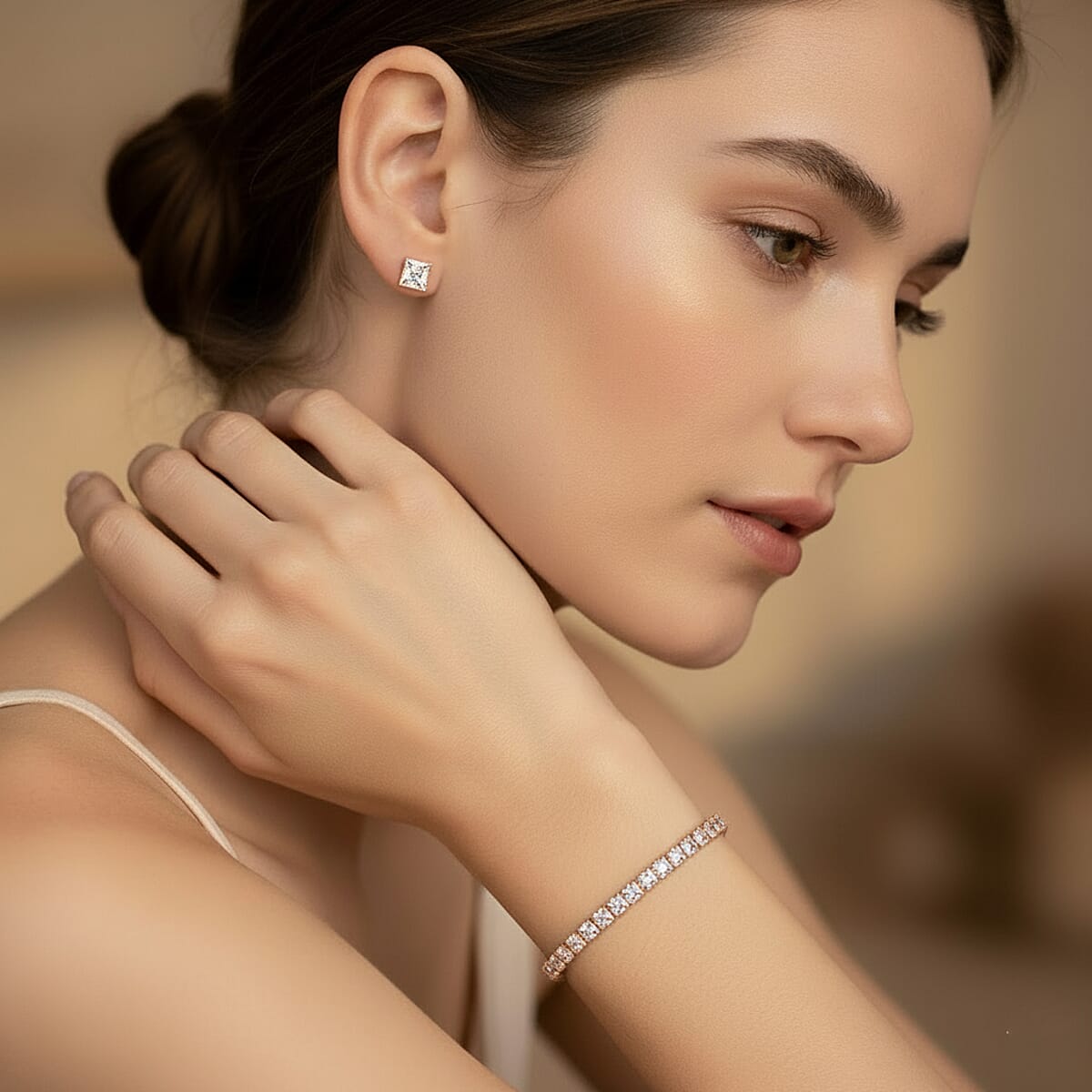 2 Piece Set - Simulated Diamond 5.60 ctw Tennis Bracelet (7.50 In) and Earrings in Rosetone image number 2