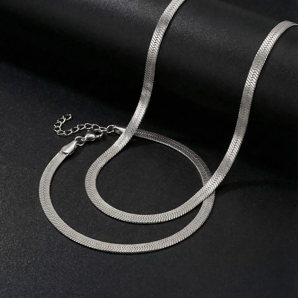 Herringbone Chain Bracelet (8.50In) and Necklace (24 Inches) in Stainless Steel image number 1