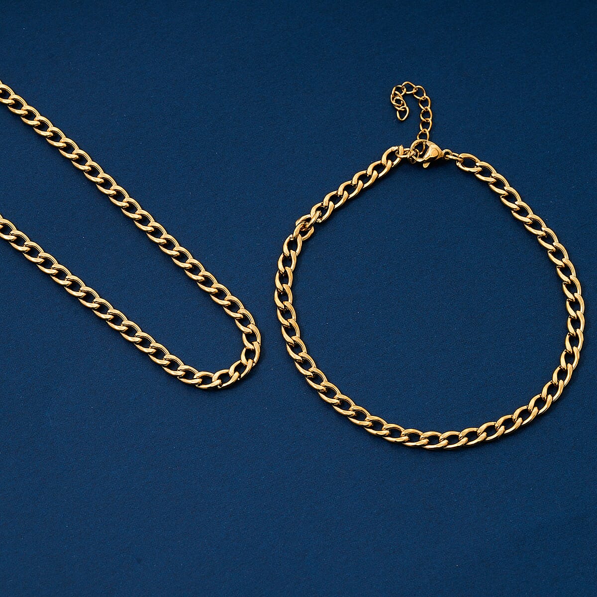 Cuban Chain Bracelet (8.50In) and Necklace (24 Inches) in ION Plated YG Stainless Steel image number 1