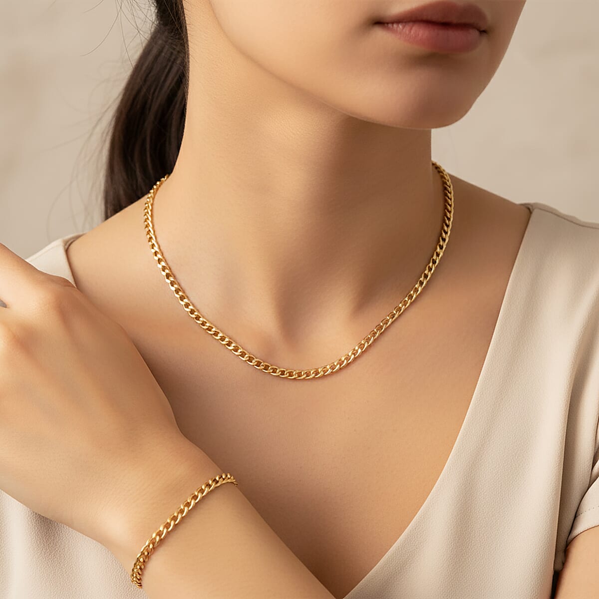 Cuban Chain Bracelet (8.50In) and Necklace (24 Inches) in ION Plated YG Stainless Steel image number 2