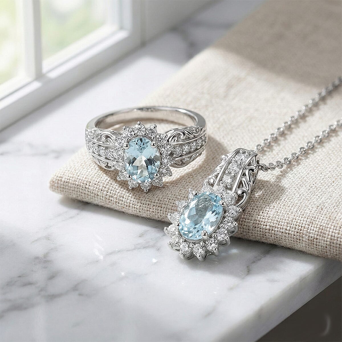 D'Joy Premium Mangoro Aquamarine and White Zircon 2.35 ctw Ring (Size 5.0) and Pendant Necklace (20 Inches) in Rhodium Over Sterling Silver(Del. In 10-12 Days) image number 1