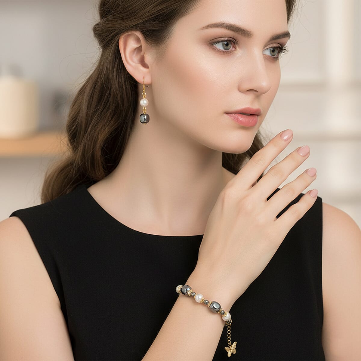 Terahertz 40.00 ctw and White Shell Pearl Beaded Bracelet with Butterfly Charm (6.5-8.5In) and Earrings in Goldtone and Stainless Steel image number 2