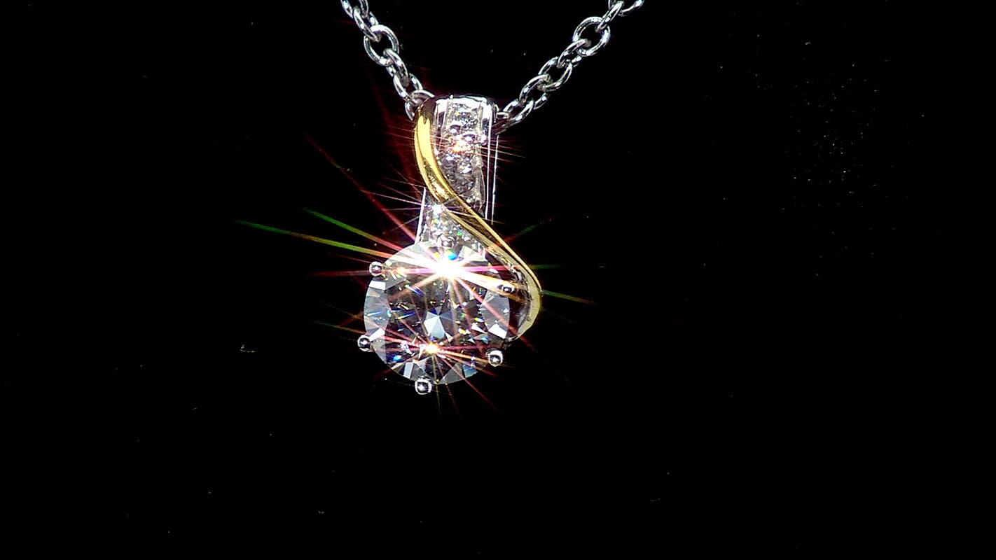 D'Joy Moissanite 1.10 ctw Pendant Necklace in 18K Vermeil YG and Platinum Over Sterling Silver (20 Inches)