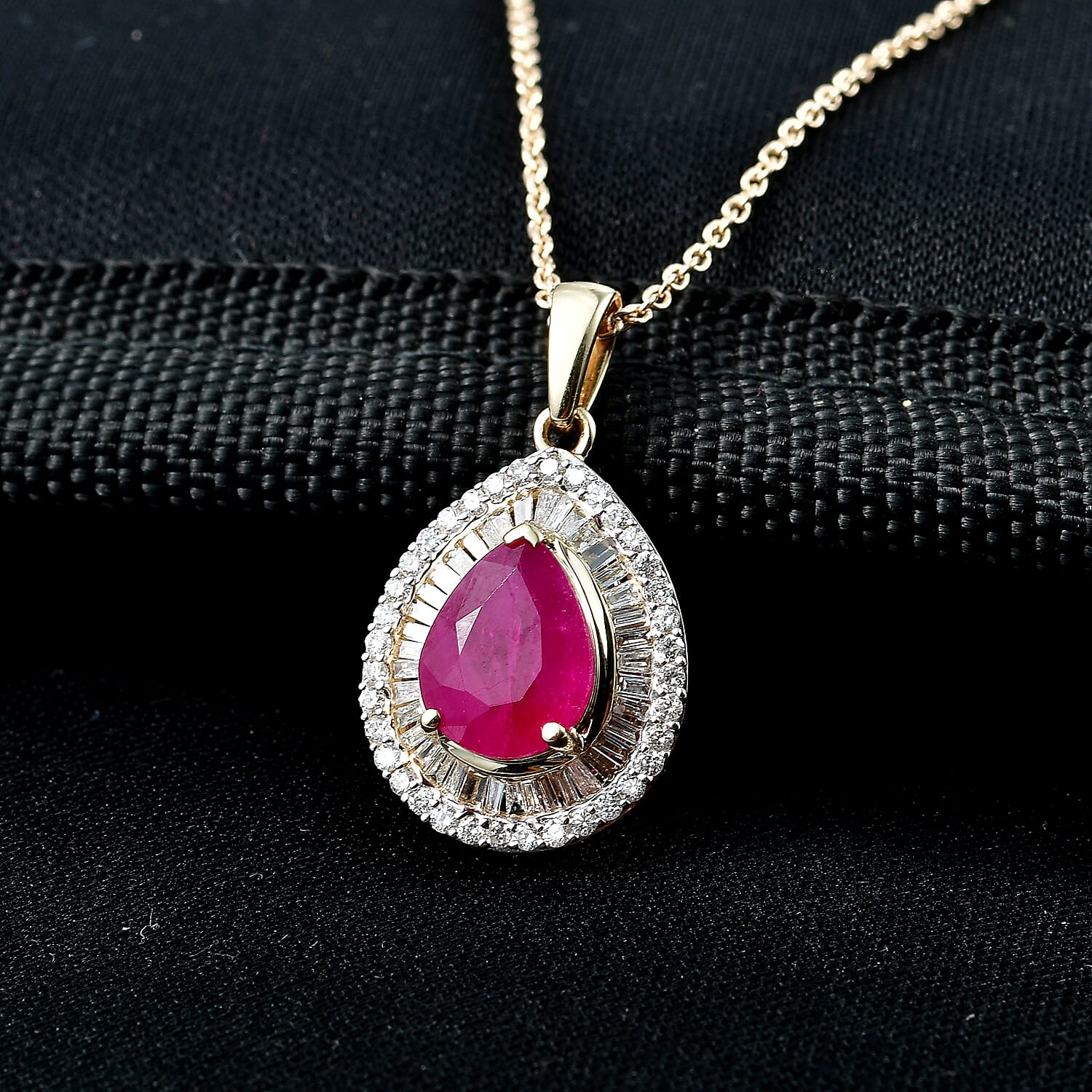 Luxoro AAA Montepuez Ruby and Diamond G-H, I2 2.15 ctw Flame Pear Pendant Necklace in 10K Yellow Gold (20 Inches)