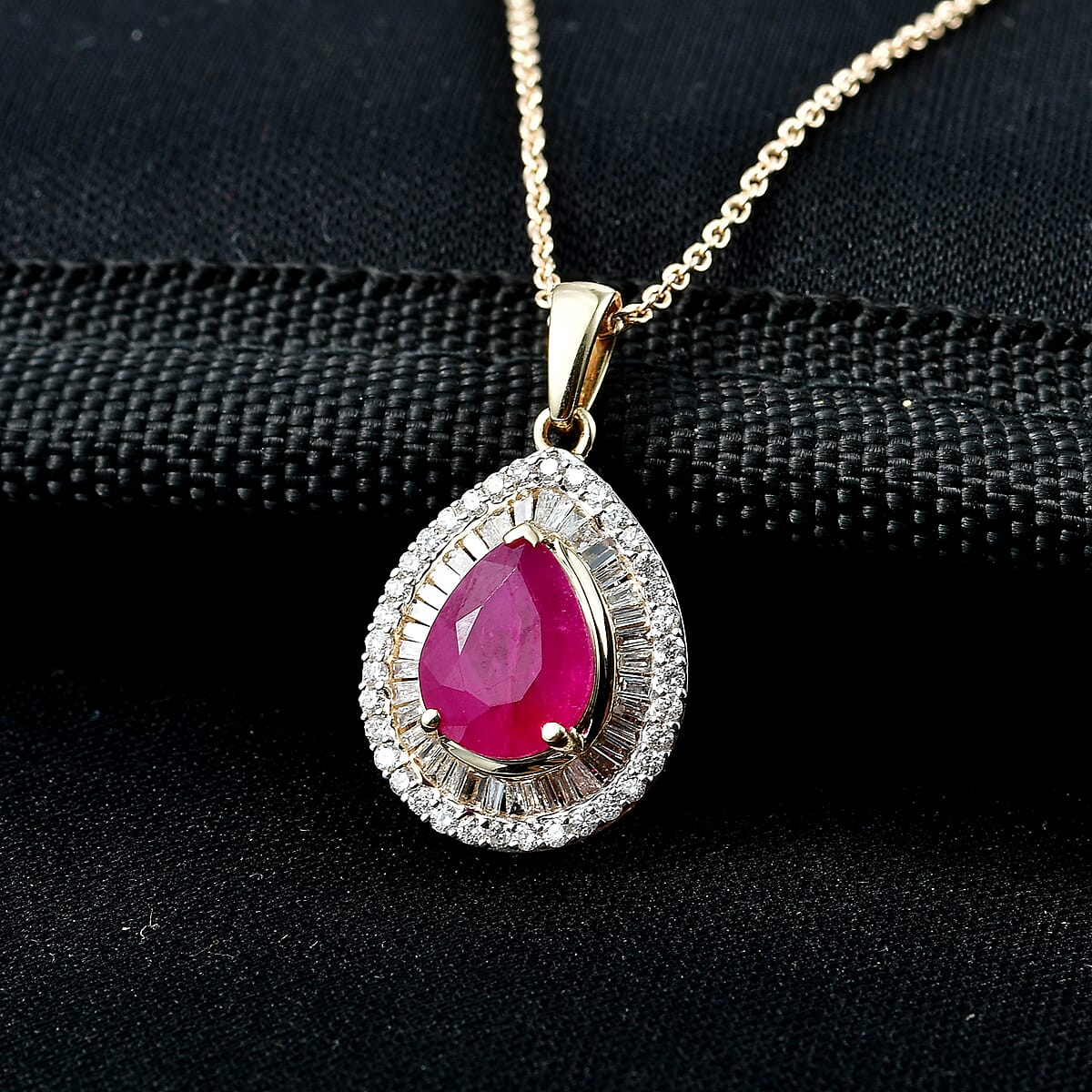 Luxoro AAA Montepuez Ruby and Diamond G-H, I2 2.30 ctw Flame Pear Pendant Necklace in 10K Yellow Gold (20 Inches) (Del. in 10-12 Days) image number 1