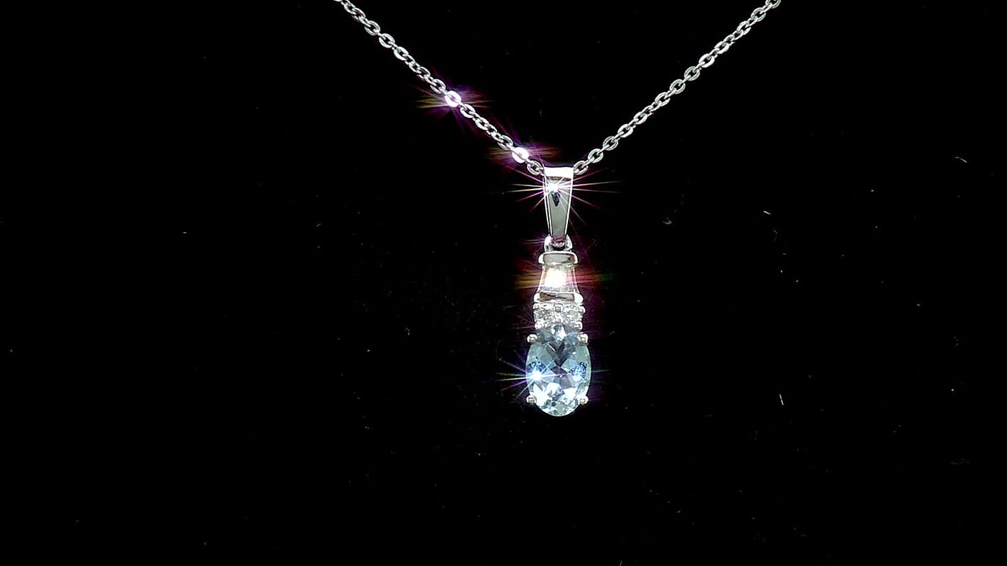 D'Joy Premium Mangoro Aquamarine and Moissanite 0.85 ctw The Blue Signature Pendant Necklace in Rhodium Over Sterling Silver 20 Inches  (Del. In 8-10 Days)