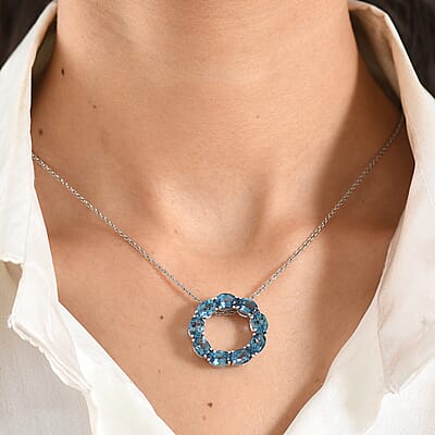 D'Joy London Blue Topaz 8.35 ctw Circle Pendant in Rhodium Over Sterling Silver with Stainless Steel (20 Inches)