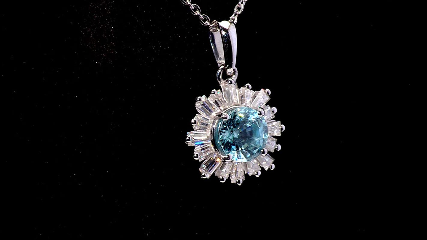 D'Joy Cambodian Blue Zircon and Moissanite 3.40 ctw Ocean Sunburst Pendant Necklace in Rhodium Over Sterling Silver 20 Inches