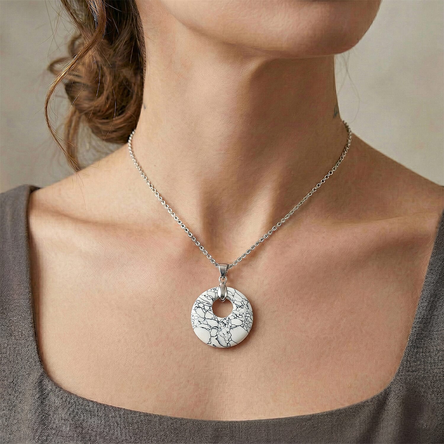 Howlite 52.35 ctw Donut Pendant in Silvertone with Stainless Steel Necklace (20 Inches)