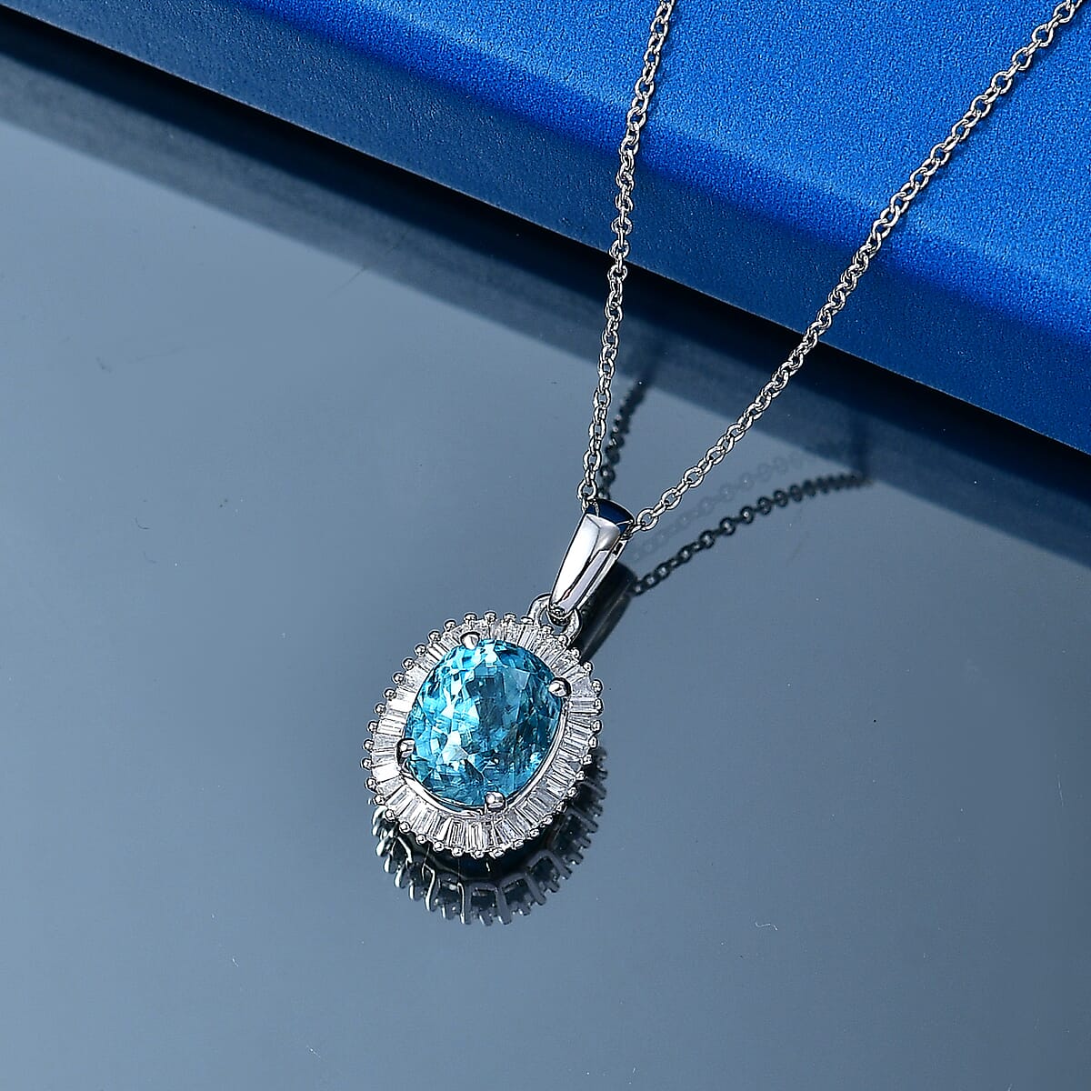 Luxoro AAA Cambodian Blue Zircon and Diamond I2 5.10 ctw Ocean Starlight Halo Pendant Necklace in 10K White Gold (20 Inches) image number 1