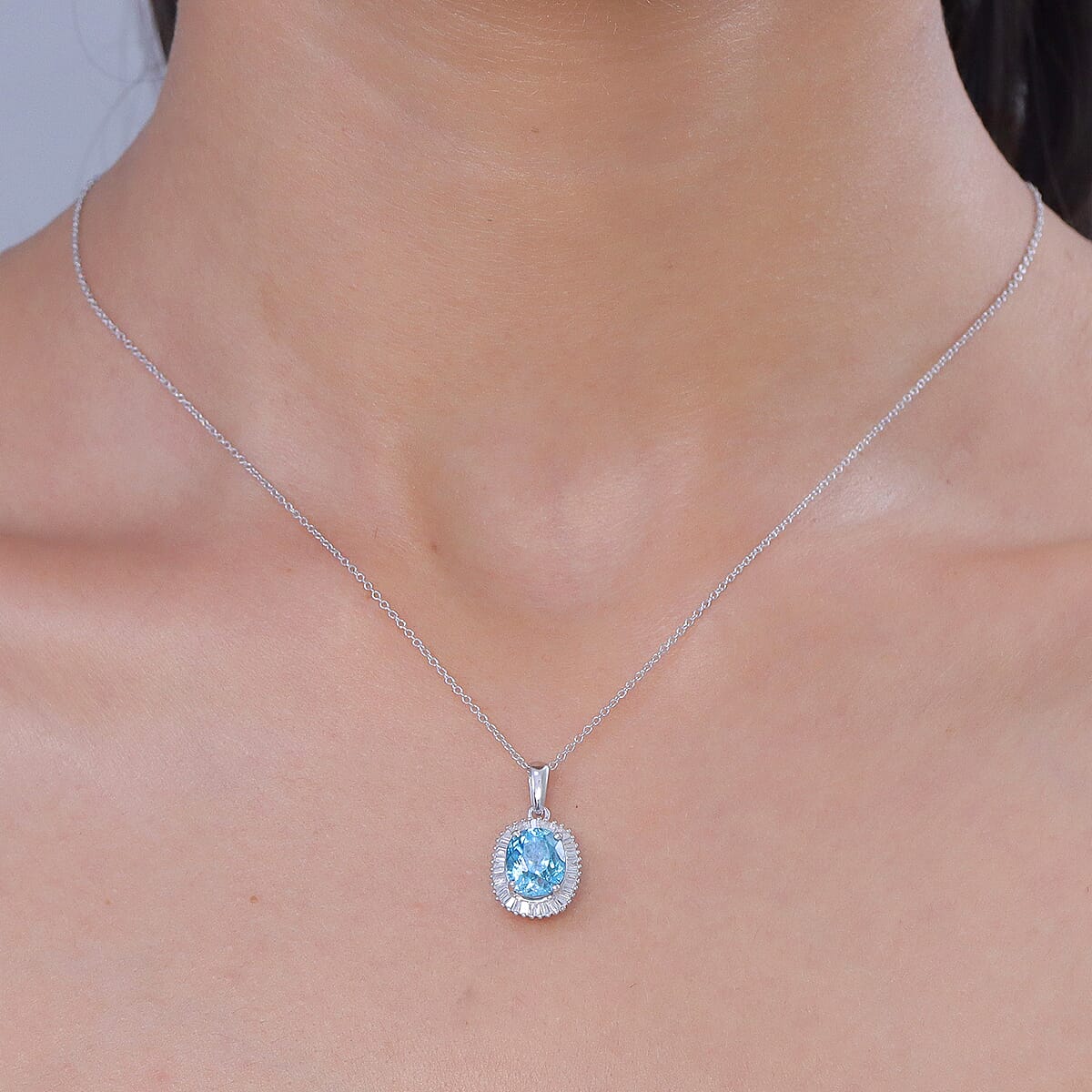 Luxoro AAA Cambodian Blue Zircon and Diamond I2 5.10 ctw Ocean Starlight Halo Pendant Necklace in 10K White Gold (20 Inches) image number 2