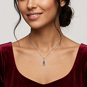 D'Joy AAA Red Zircon and Moissanite 0.90 ctw Royal Eye Spark Pendant Necklace in Rhodium Over Sterling Silver 20 Inches