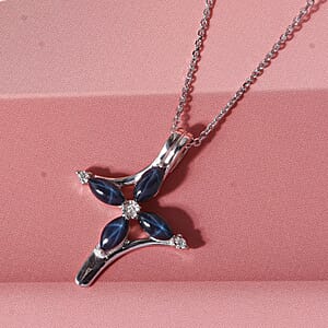 D'Joy Premium Blue Star Sapphire (DF) and Moissanite 1.65 ctw Fleur Cross Pendant Necklace in Rhodium Over Sterling Silver 18 Inches